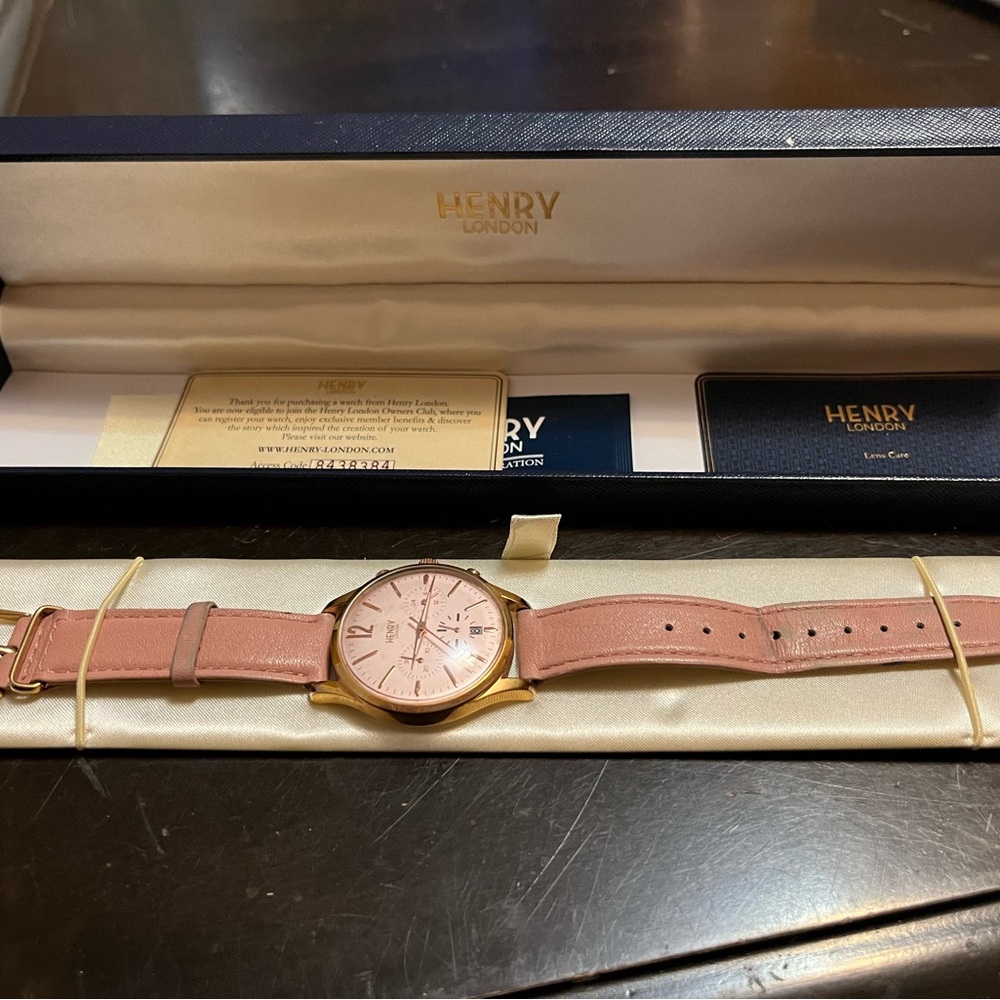 Women's Pink and Gold Watch